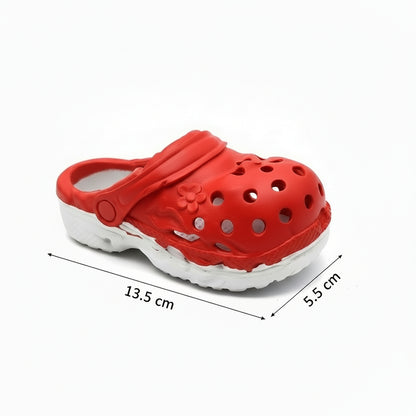 Red slipper with white background and measurements